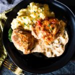 Braised chicken thighs with creamy tequila sauce served with polenta