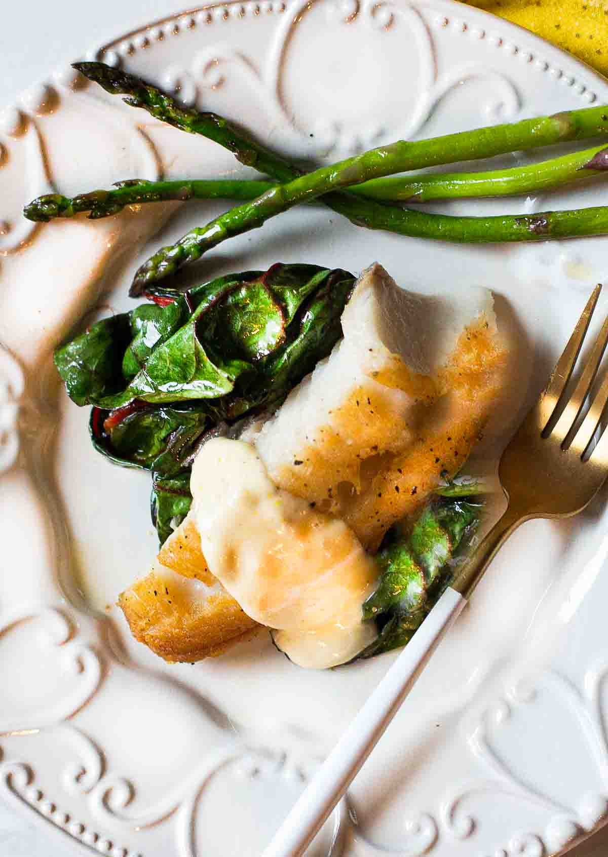 Ling cod recipe served with lemon aioli and swiss chard.
