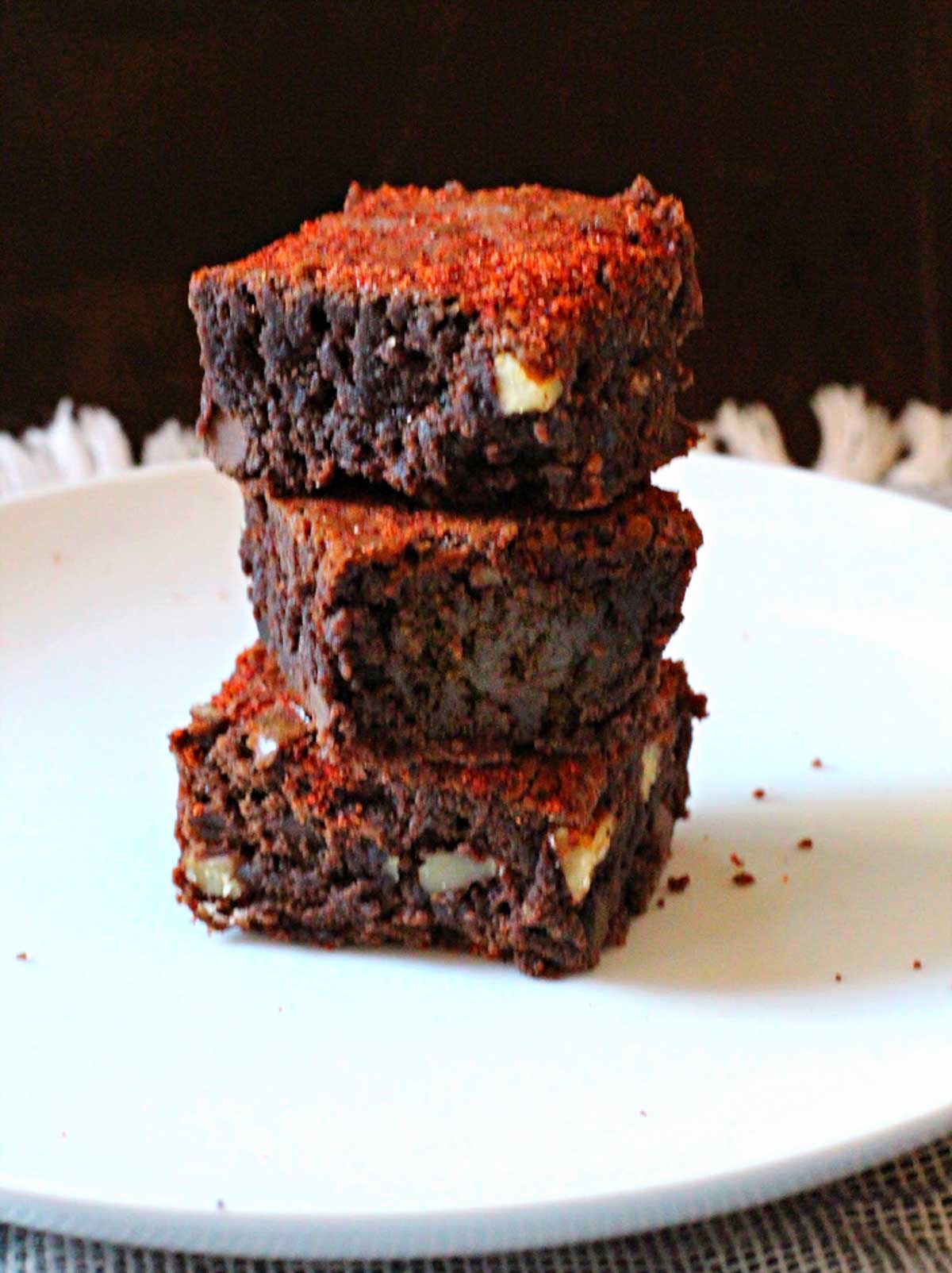 Orange chocolate brownies with chile powder sprinkled on top.