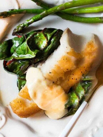 Lingcod recipe served with swiss chard and lemon aioli.