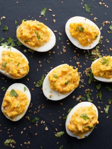 Spicy deviled eggs topped with spicy panko bread crumbs
