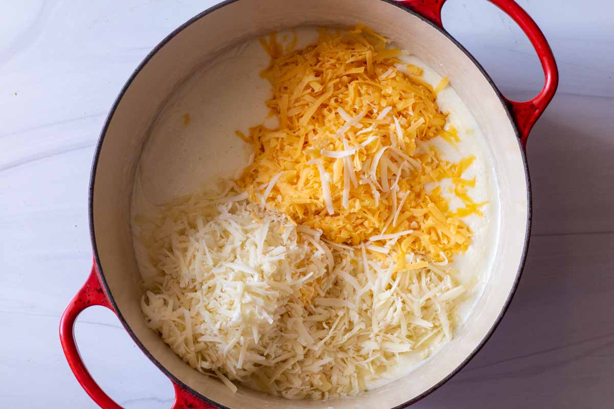 making macaroni and cheese with grated gruyere and sharp cheddar