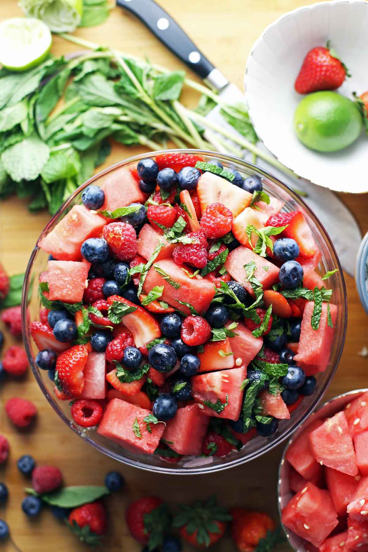 Watermelon berry salad served in a glass bowl.