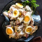Blue Cheese Potato Salad with Bacon and sliced hard boiled eggs.
