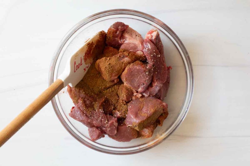 Spices mixed with lamb shoulder pieces to make lamb tatine