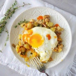 Chicken Hash topped with a fried egg.