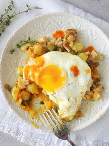 Chicken Hash topped with a fried egg.