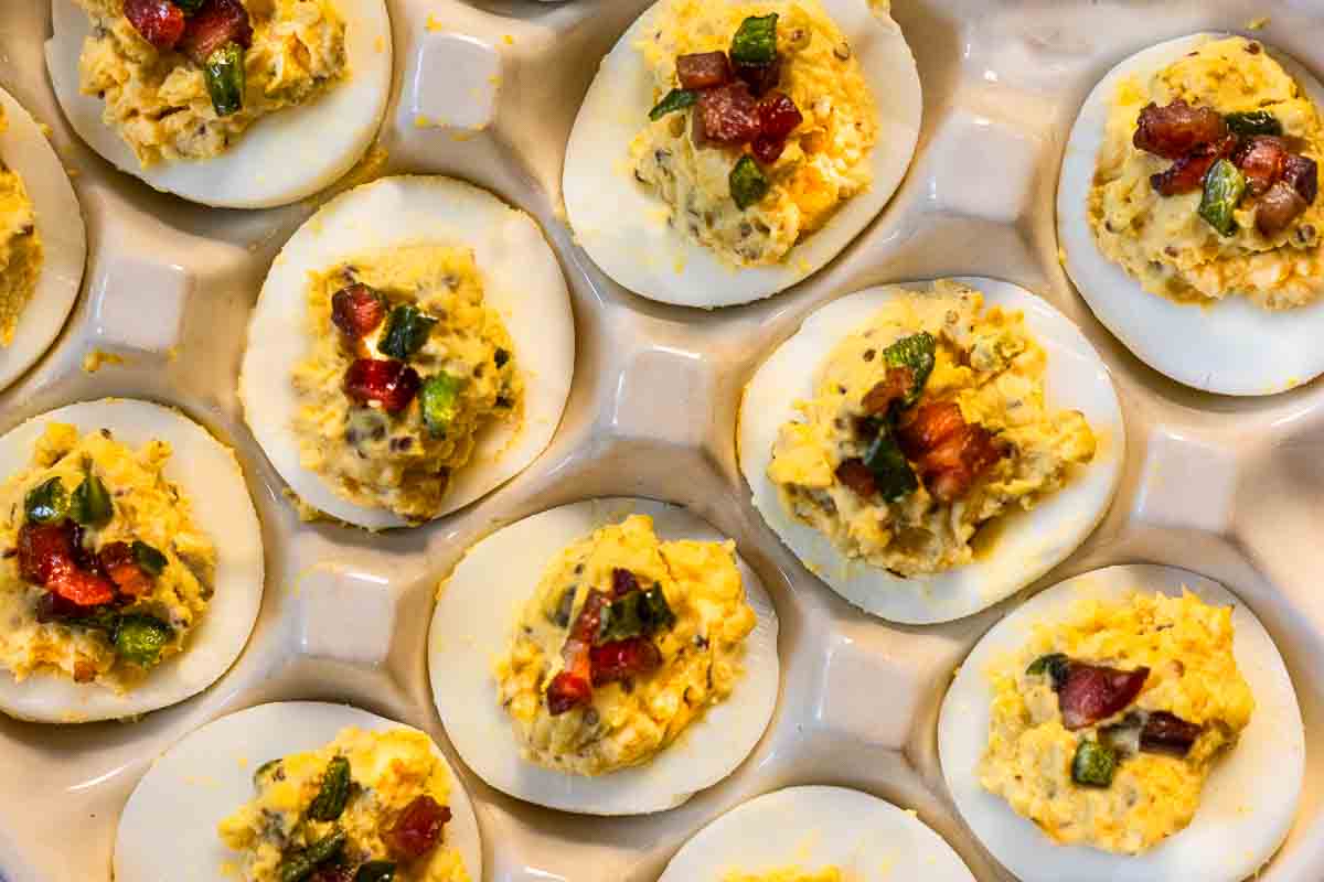 Deviled eggs with bacon and jalapeno.