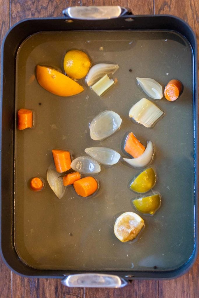 Preparing pan to roast a pork should butt