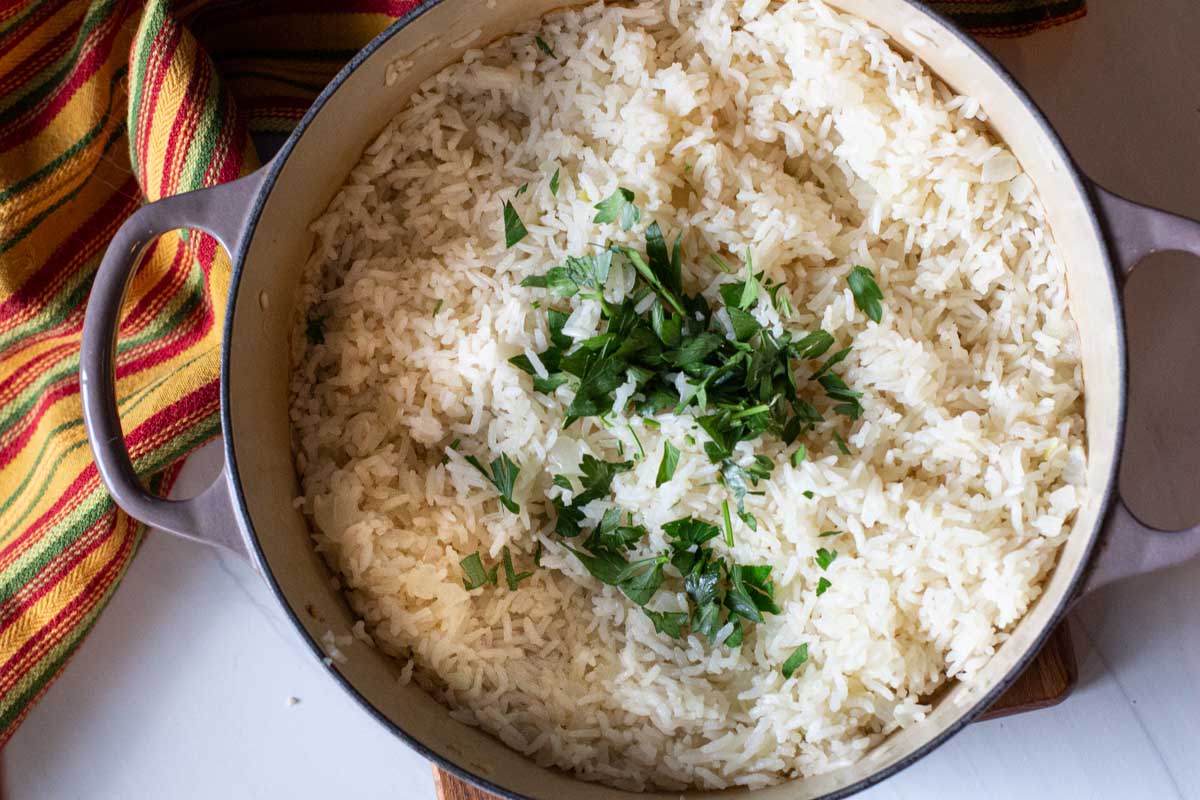 Baked rice garnished with parsley
