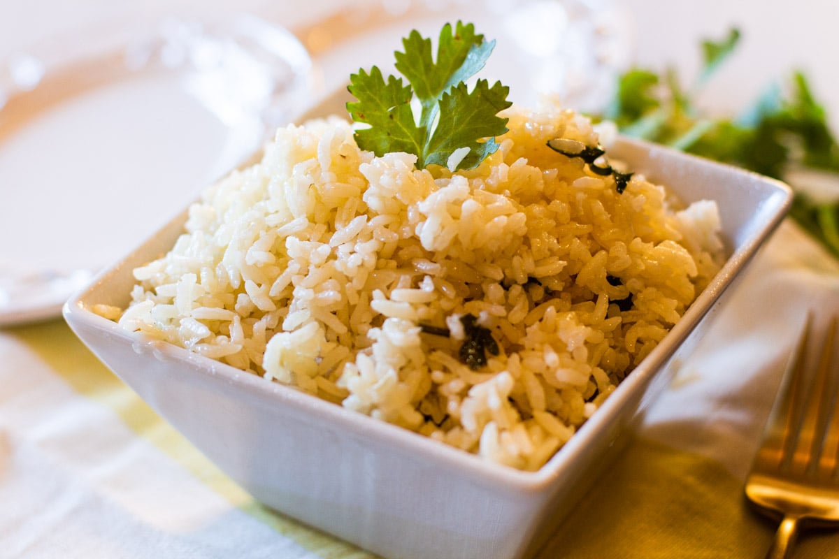 Oven baked rice garnished with parsley