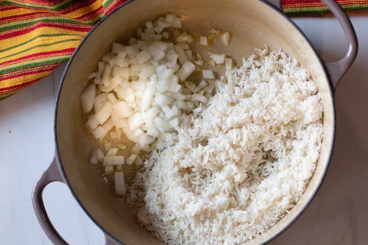Toasting rice and onions for oven rice