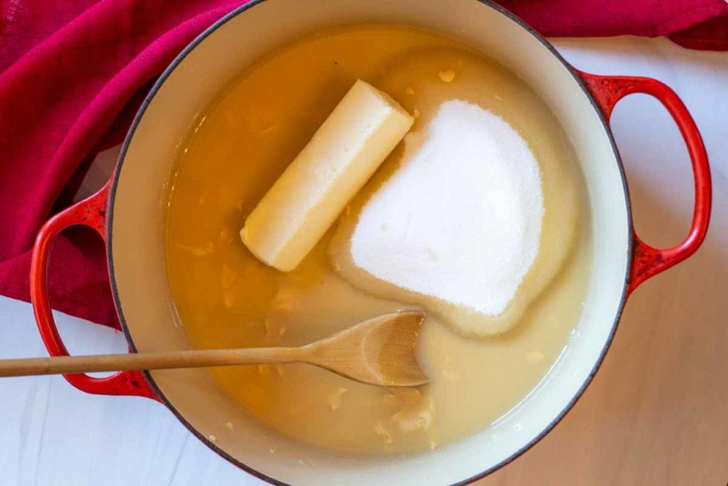 butter, sugar and condensed milk in a pan to make easy chocolate fudge