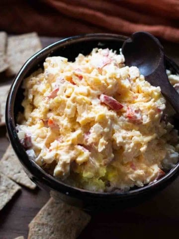 Dubliner Cheese Spread in a bowl served with crackers.