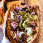 Bison steak and cheese sandwich with queso blanco