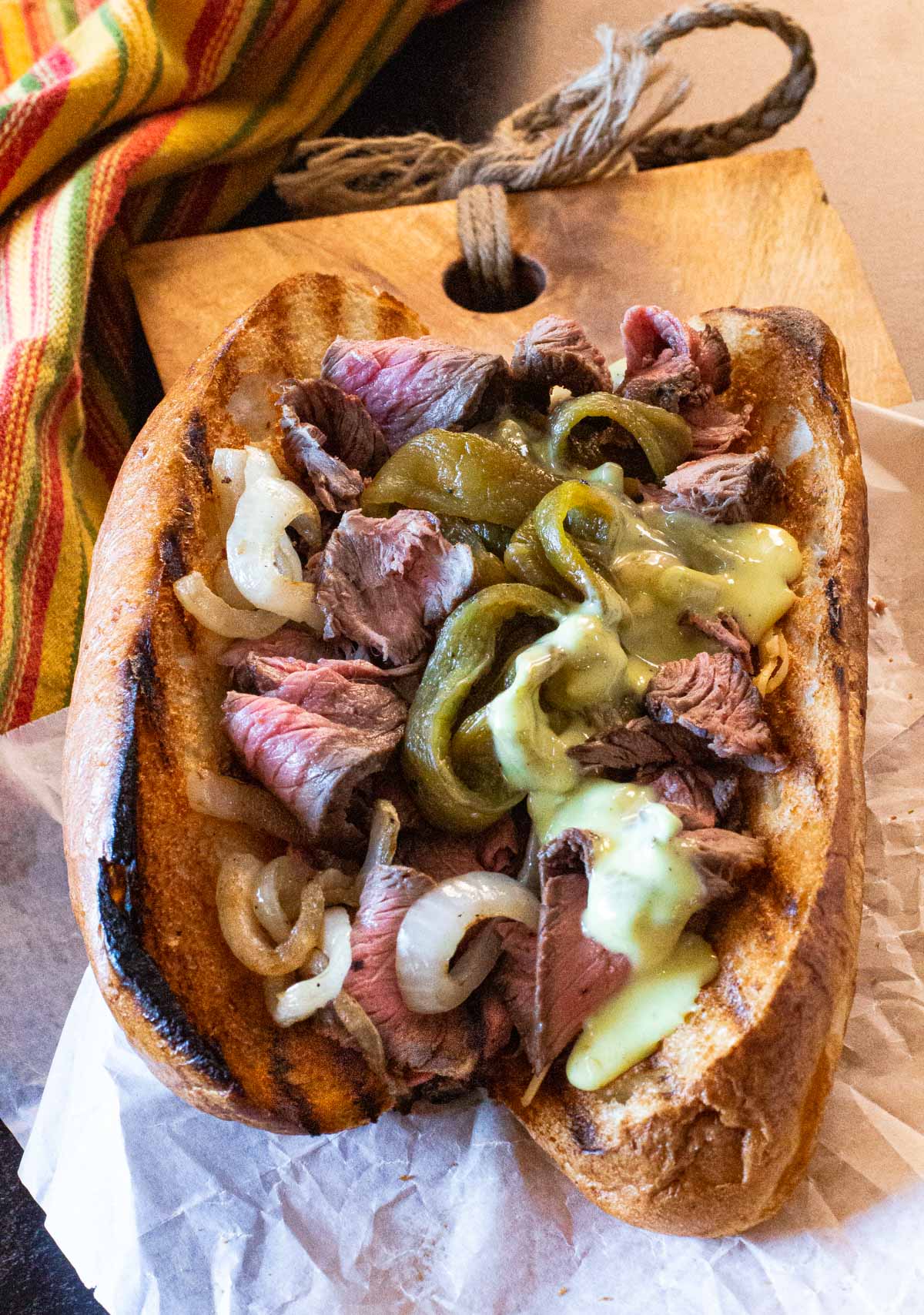 Bison steak and cheese sandwich with queso blanco