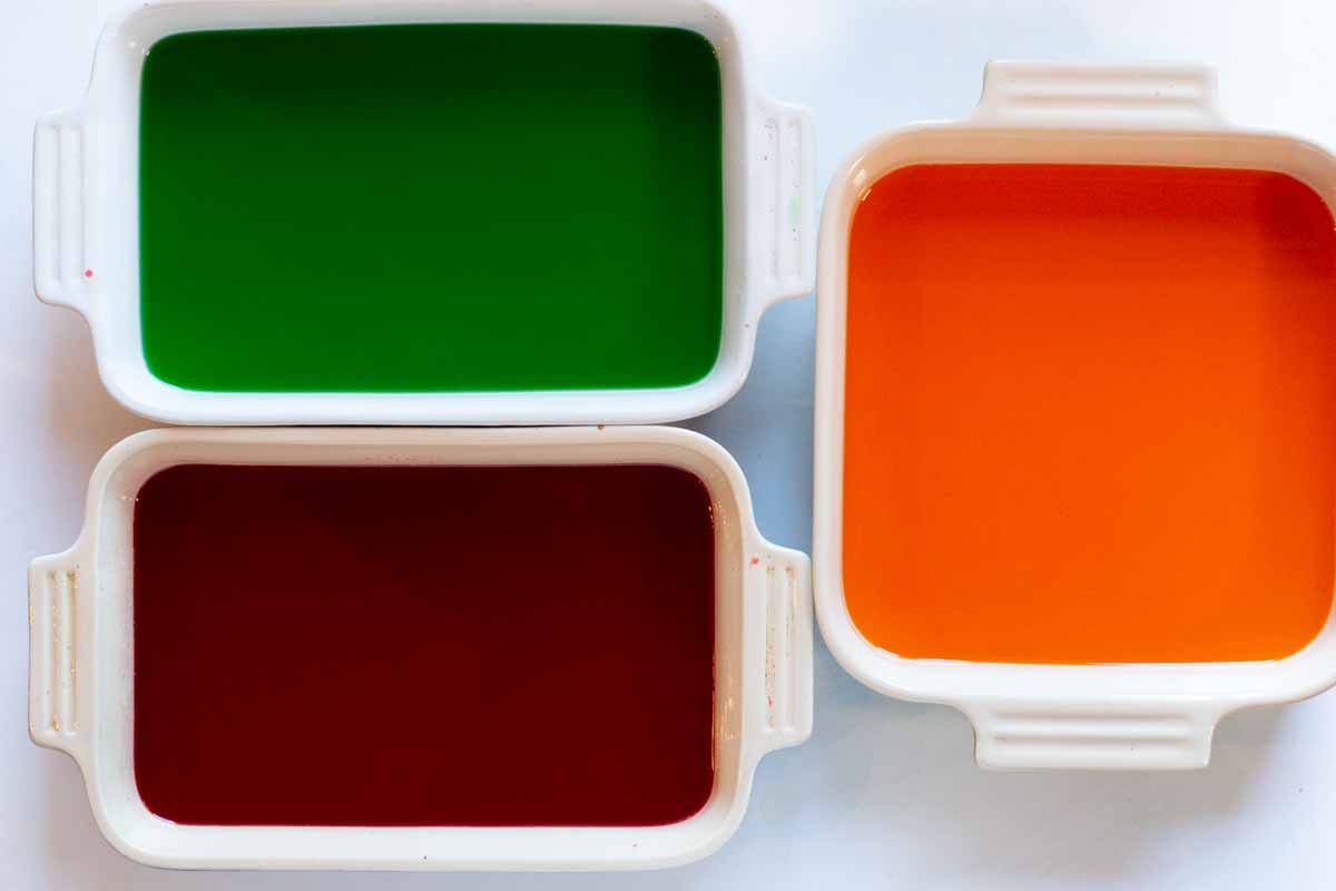 Jell-o in Le Creuset pans, ready to chill and set up.