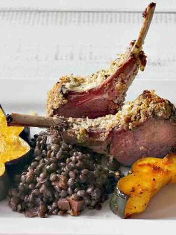 Pistachio crusted rack of lamb served with puy lentils.