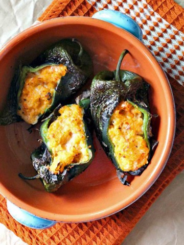 Roasted poblano peppers stuffed with spicy mashed potatoes.