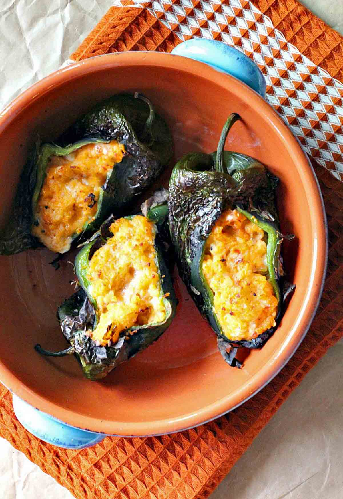 Roasted poblano peppers stuffed with spicy mashed potatoes.