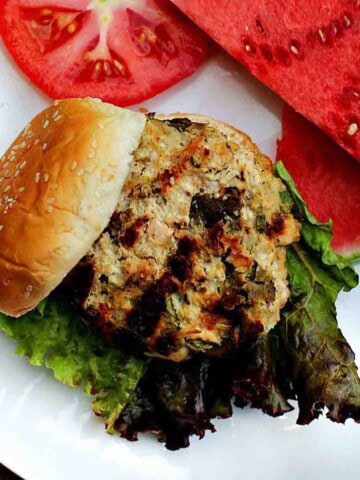 Southwestern grilled ground chicken burgers served with watermelon.