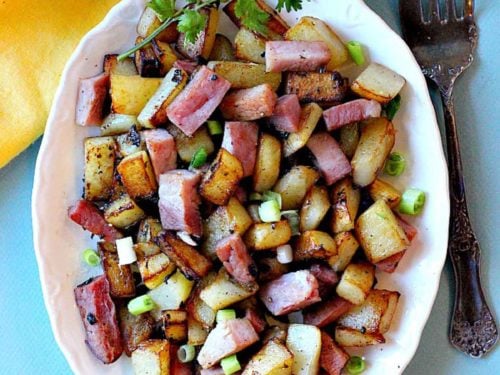 https://highlandsranchfoodie.com/wp-content/uploads/2022/08/fried-breakfast-potatoes-with-ham-500x375.jpg