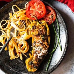 Stuffed frying peppers with Italian sausage.