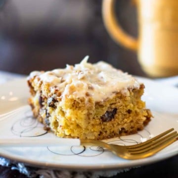 A slice of old fashioned pineapple cake made with crushed pineapple.