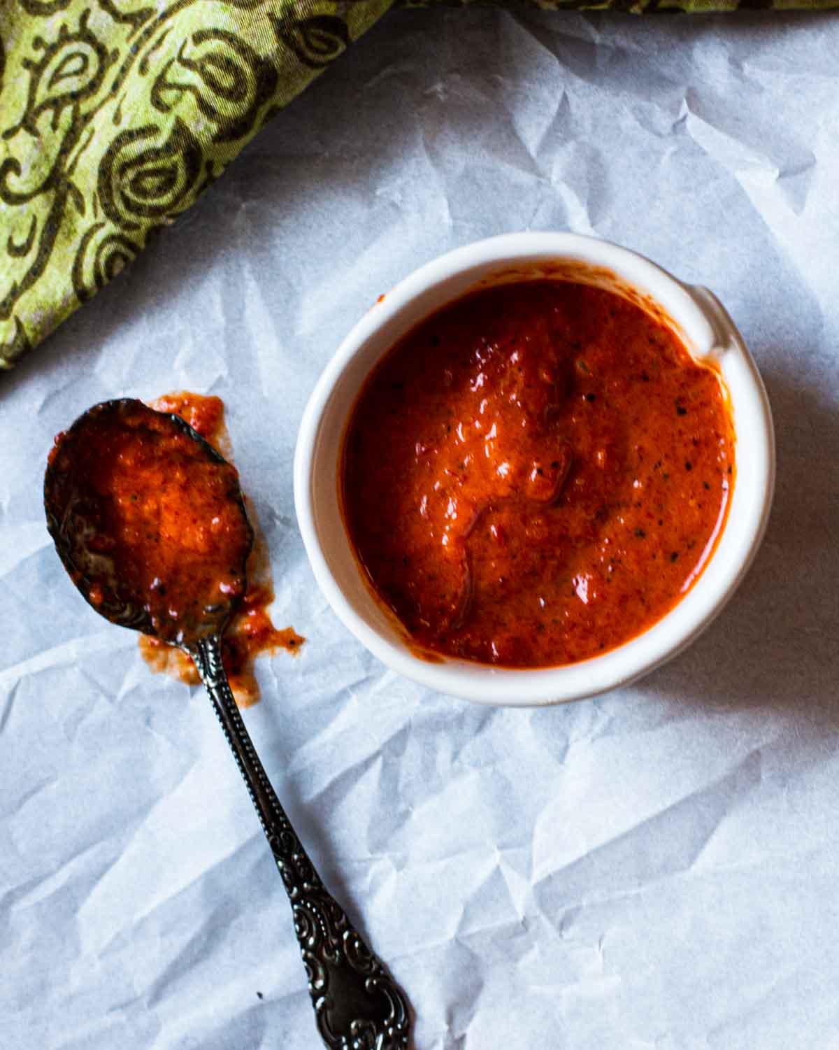 Red pepper coulis in a serving bowl.