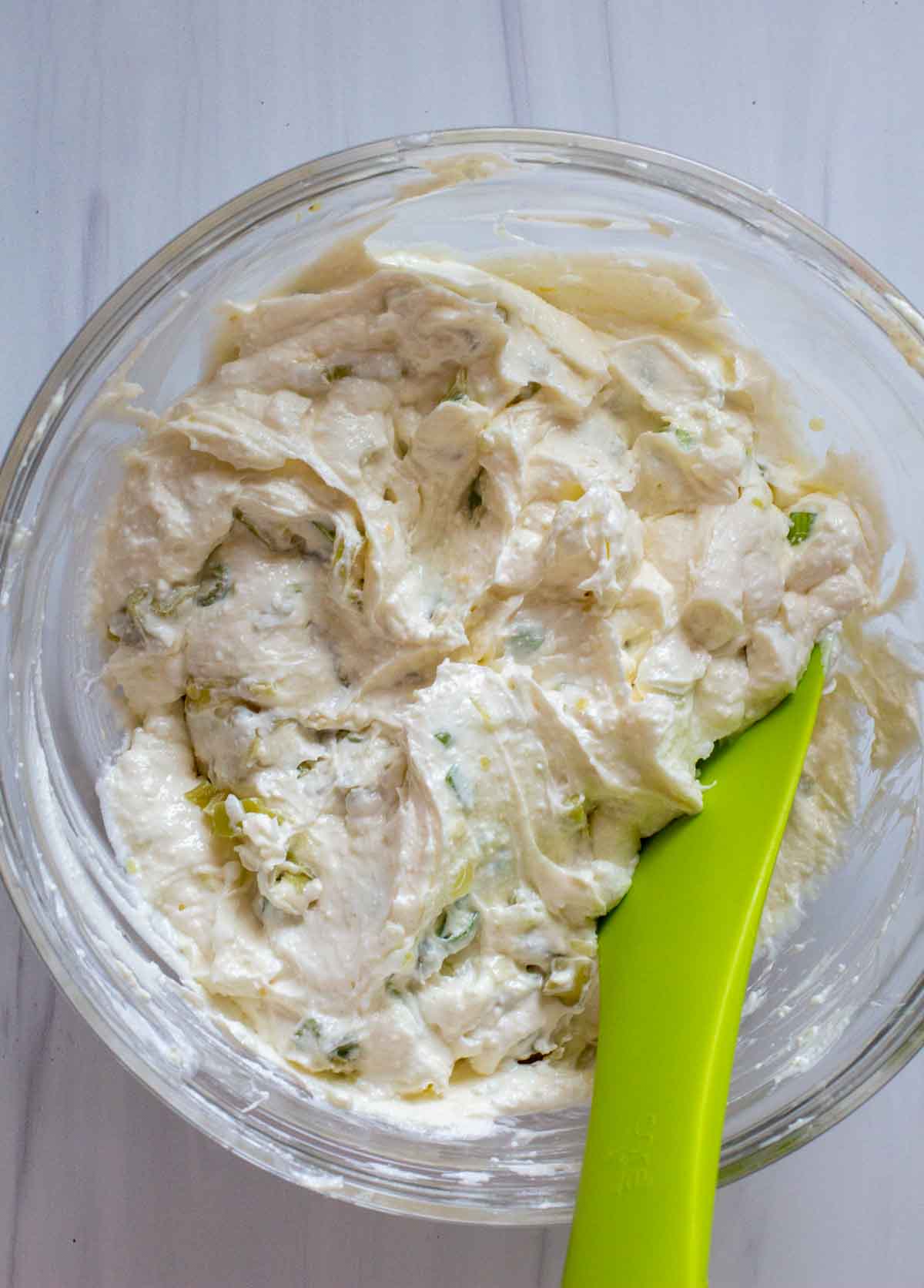 Blended vegetables and cheeses to make whipped feta dip.