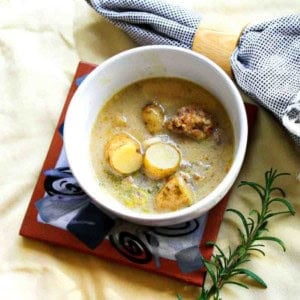 A bowl of creamy sausage potato soup.