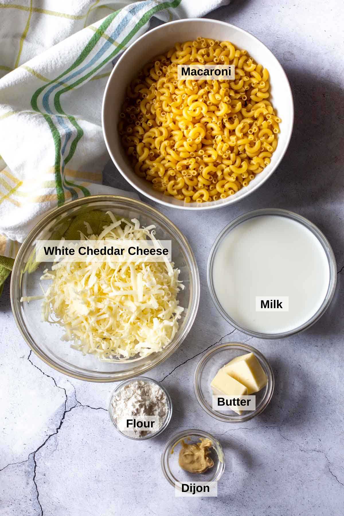 Ingredients to make white cheddar mac and cheese.