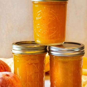 Jars of freezer peach jam.