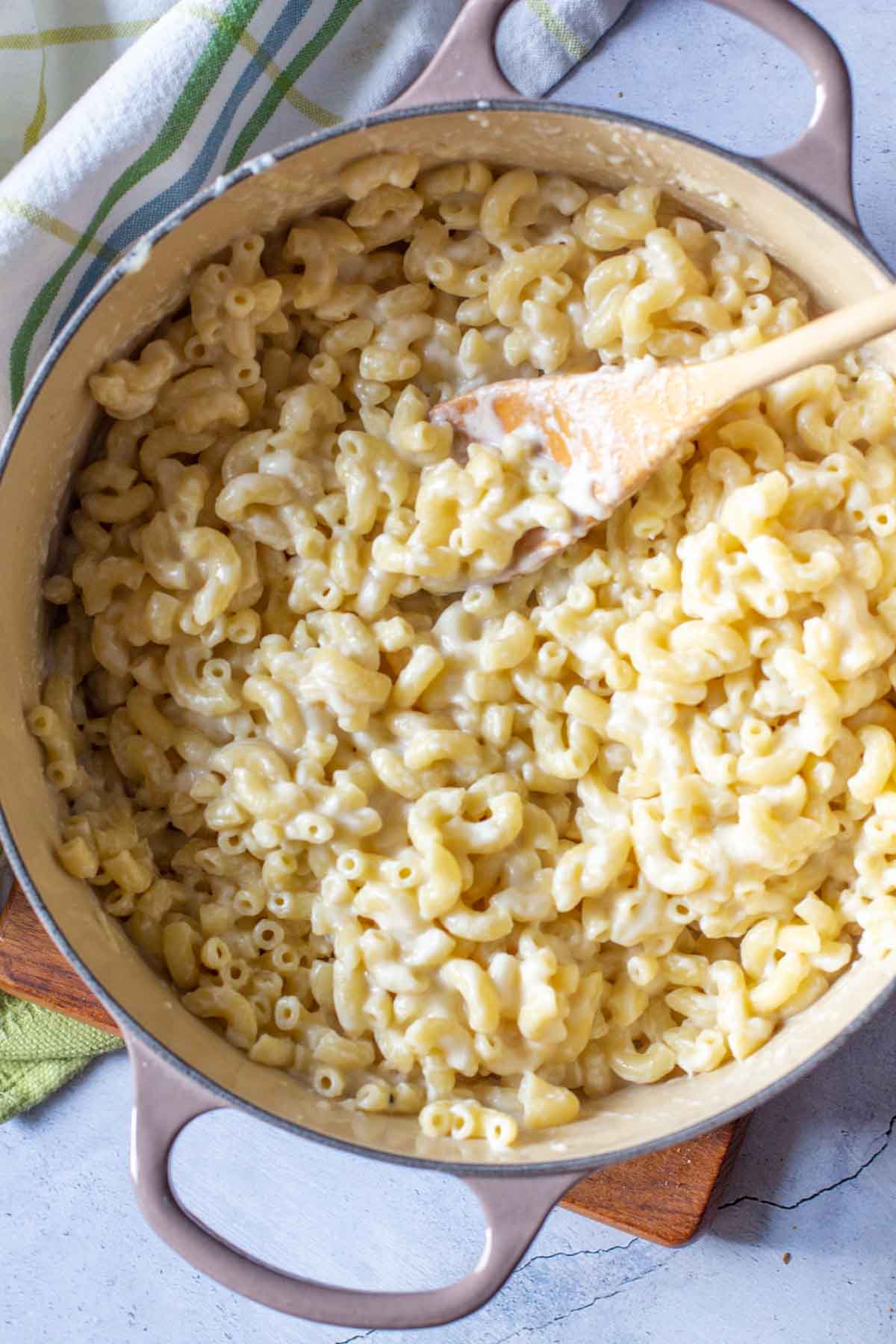 Making stove top white cheddar mac and cheese.