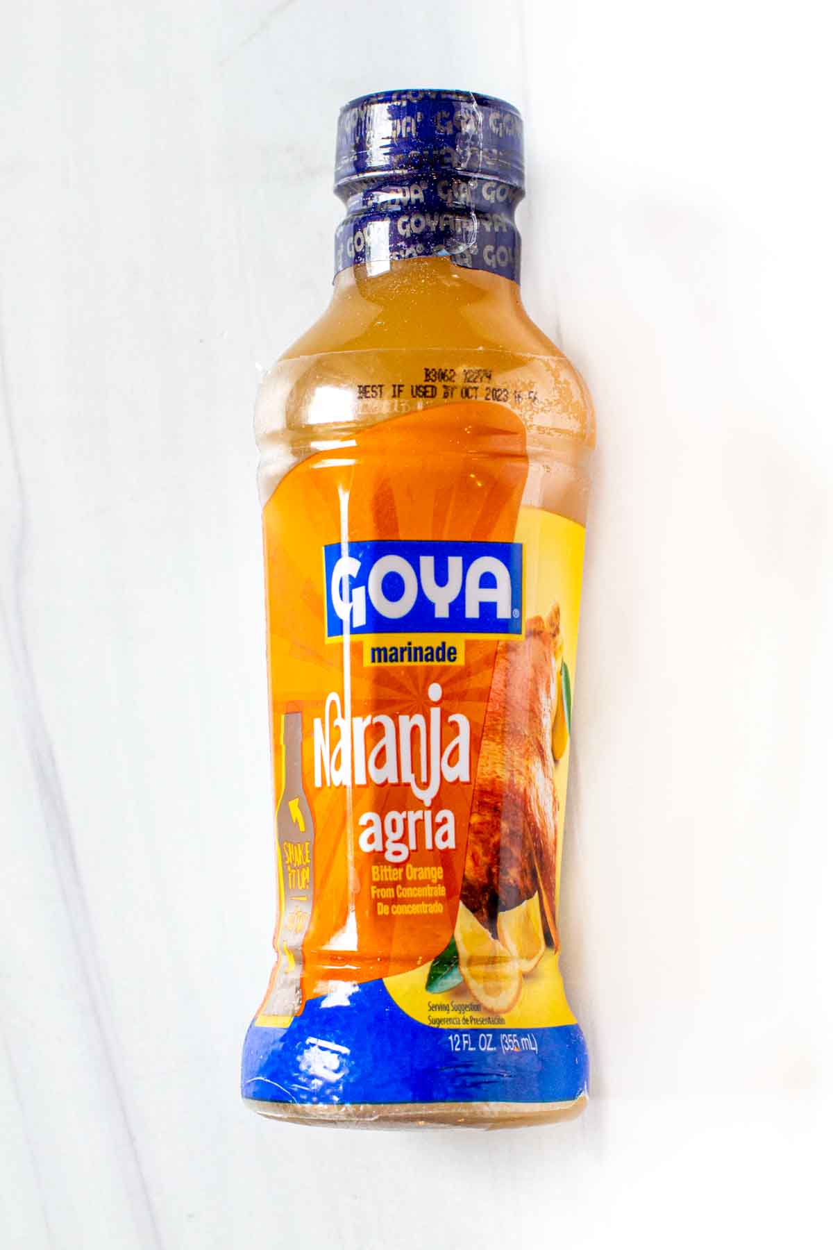 Bottle of Naranja Agria to make pollo asado.