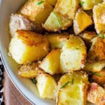 Crusted parmesan potatoes in a bowl.