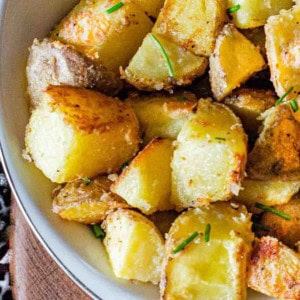 Crusted parmesan potatoes in a bowl.