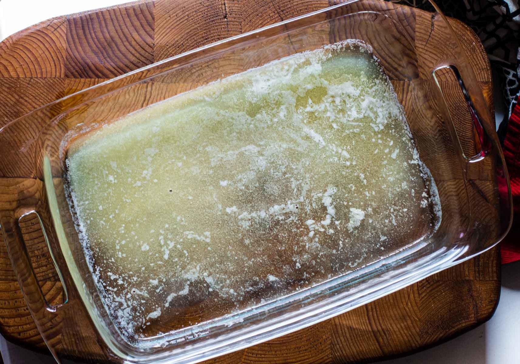 Melting butter in a pyrex casserole dish.
