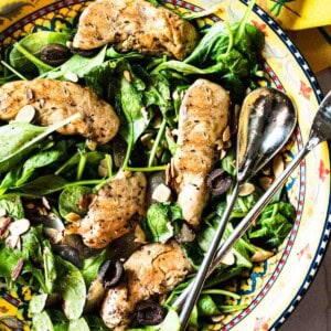 Wilted spinach salad with grilled chicken.
