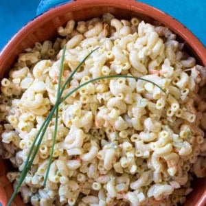 Amish Macaroni Salad garnished with chives.