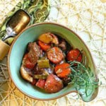 Bison stew served in a green bowl.