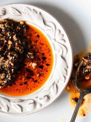 Salsa Macha, Mexican chile oil on a white plate.