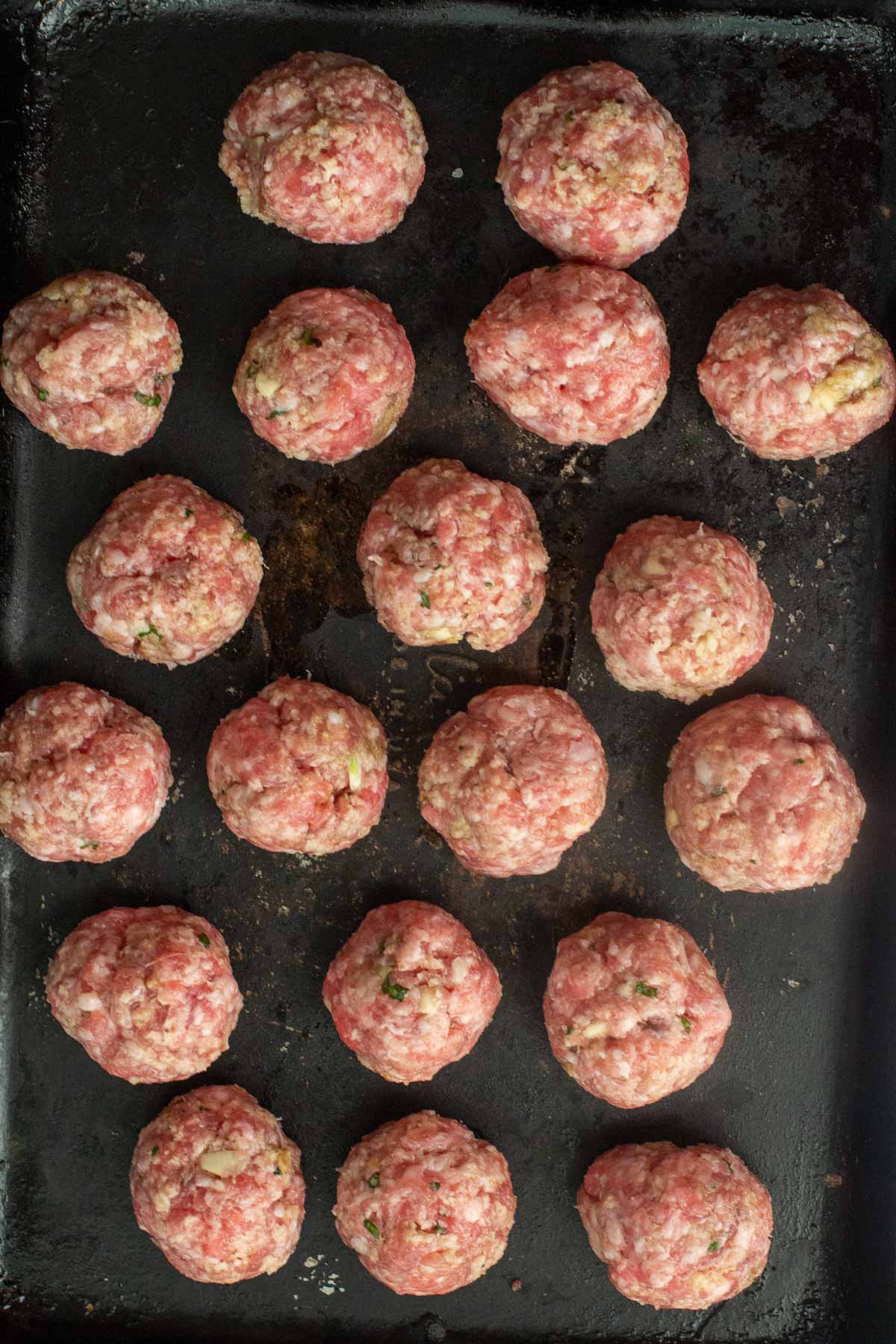 Pork meatballs ready to cook.