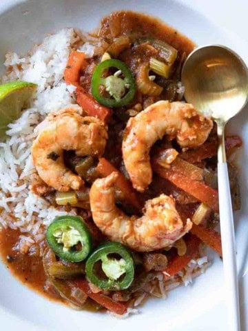 Shrimp stew served over rice.