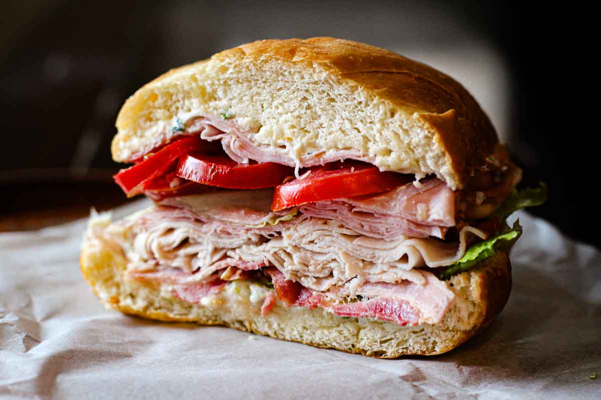 A slice of club sub sandwich.