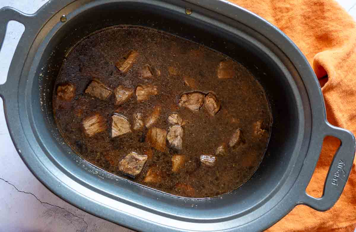 Making slow cooker beef tips with gravy.