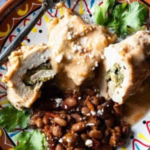 Baked chicken cutlets sutffed green chile peppers and cheese.