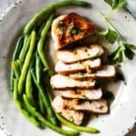 Honey garlic pork chops served with green beans.