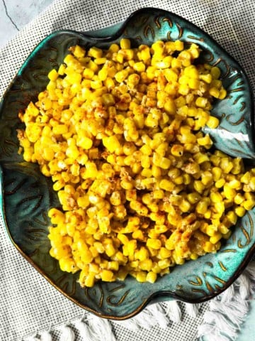 Honey Butter Skillet Corn in a blue serving bowl.