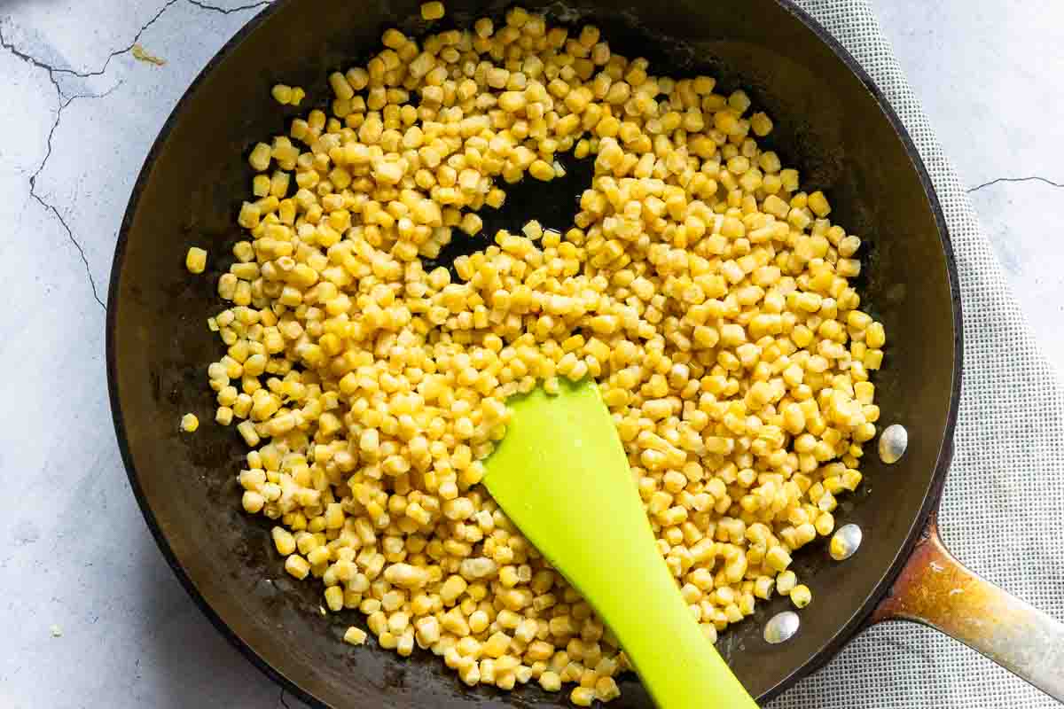 Cooking honey butter skillet corn in a large skillet.